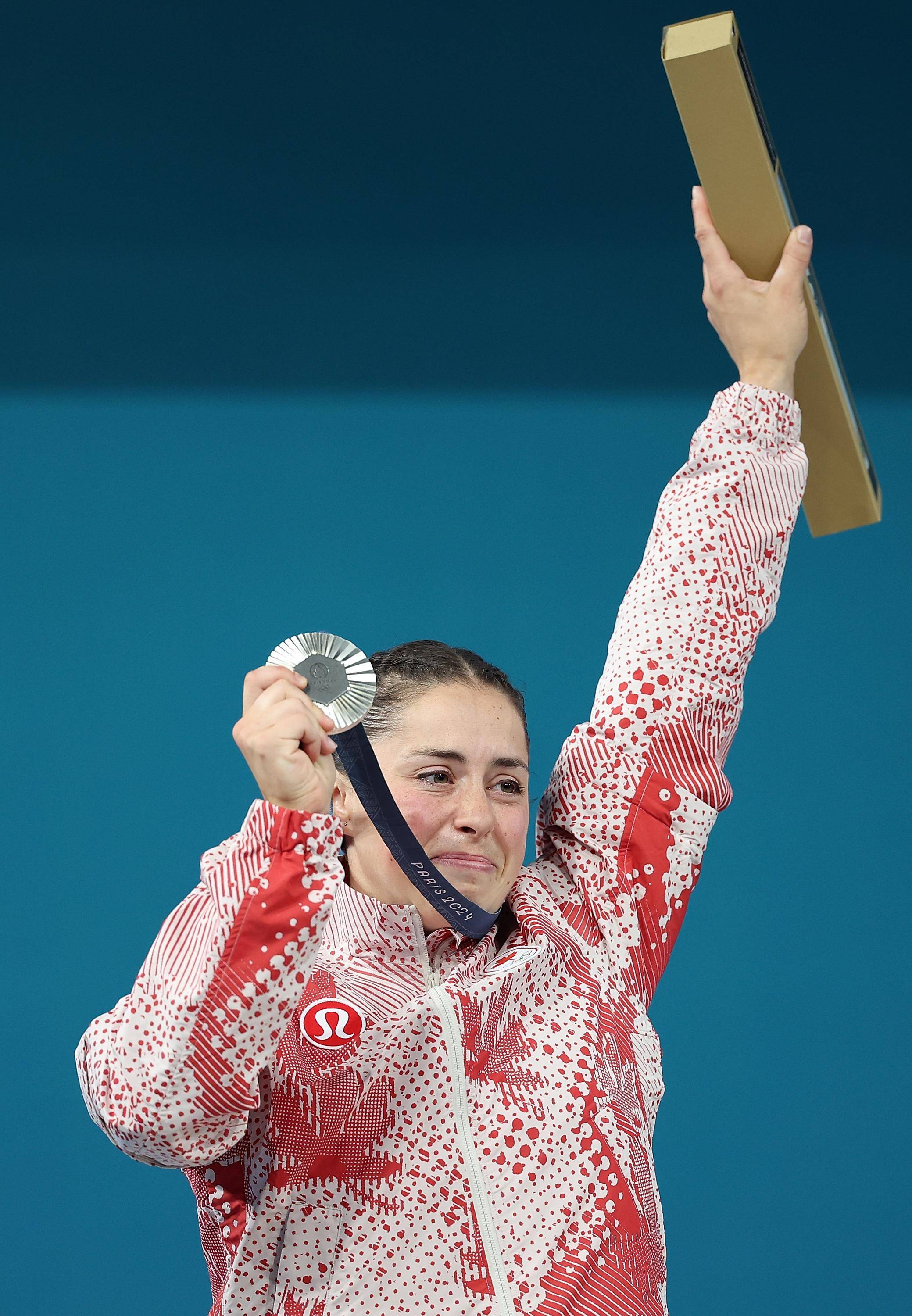 加拿大举重选手斩获金牌,漂亮收官 加拿大举重选手斩获金牌,漂亮收官